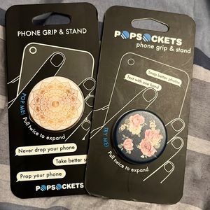 Set of 2 pop sockets. Compatible with all phones: Never opened